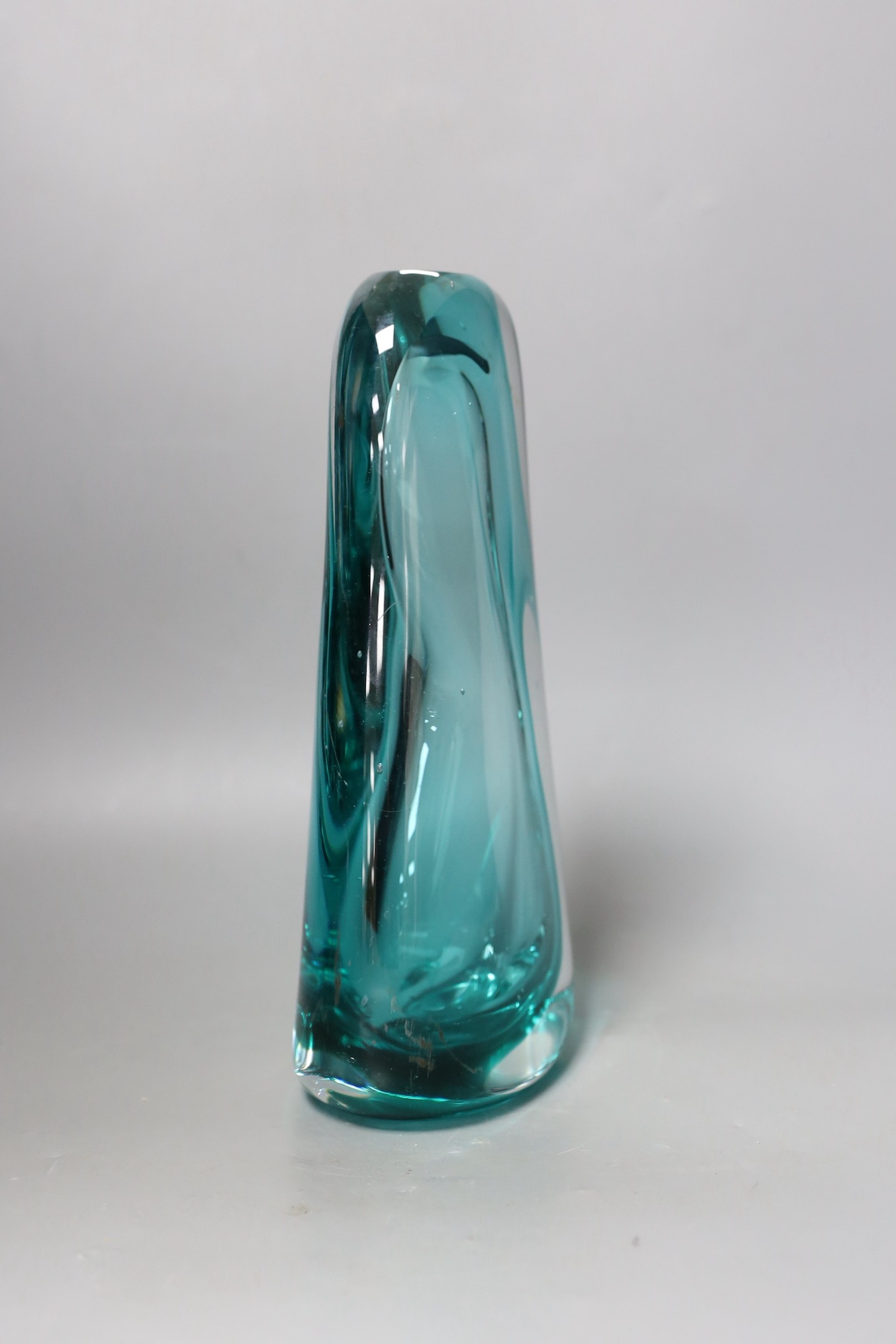 A large green glass free-form sculpture, possibly Murano, 30cms high